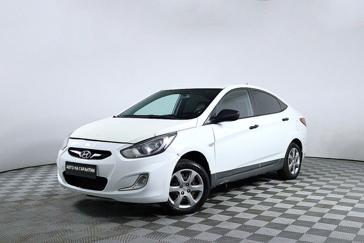 Купить б/у Hyundai Solaris седан I поколение (белый) 2013 года в Москве за  752 000 ₽ - Quto.ru